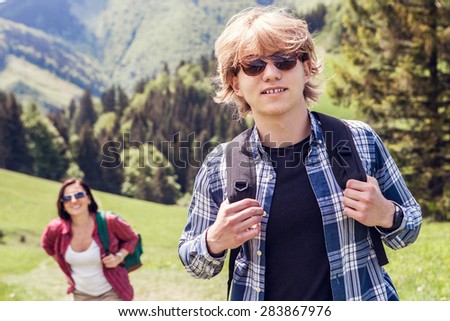 Two mountain hiker travelers