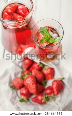 Fresh strawberry with cooling homemade cocktail