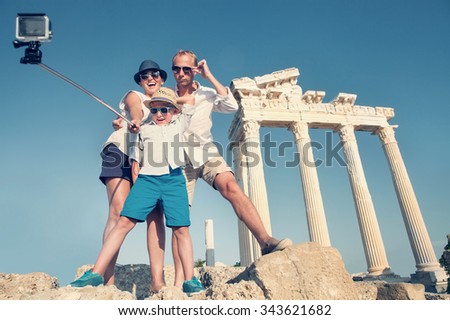 Happy family selfie travel photo cropping for share in social network. Temple of Apollo,Side,Turkey