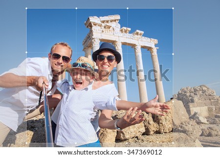 Positive young family take a picture for share in social network, Temple of Apollo,Side,Turkey