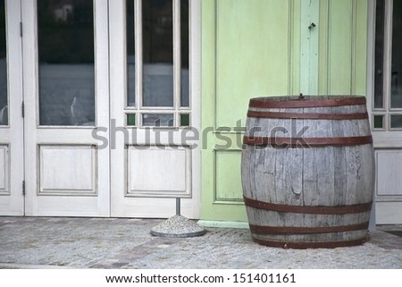 Old barrel next to the front door of a store in Lake Bled Slovenia.