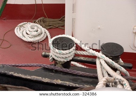 Cleats with coiled rope on a tug boat in the Mississippi River in New Orleans