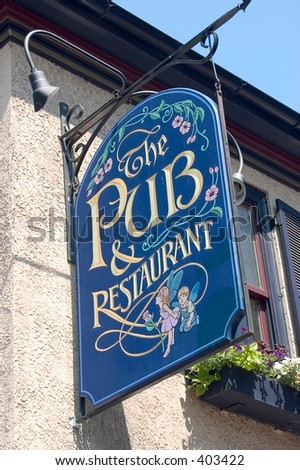 Pub and restaurant sign hanging above the entrance door to a restaurant in the square in Gettysburg, PA.