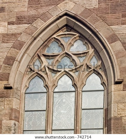 Arched window on Saint John\'s Church in Paterson, NJ.