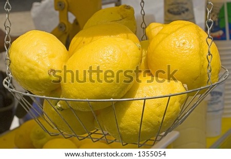 Lemons in a basket at a stand at a food festival on 9th Avenue in New York City.
