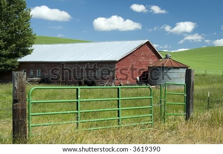 Cattle barn with a low silo in the Palouse region of eastern Washington