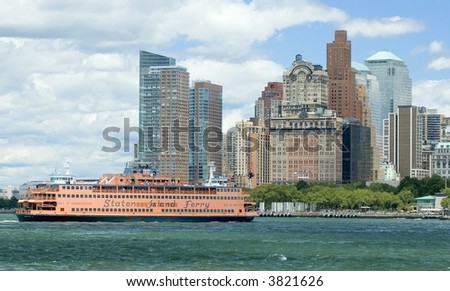Staten Island Ferry in the upper bay of New York City against the skyline of lower Manhattan