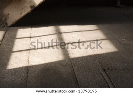 Shadow of a window on the old wood floor of the mill along Mill Creek near Marlinton West Virginia.