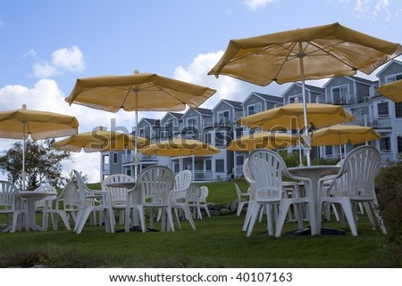 Yellow umbrellas on a patio.