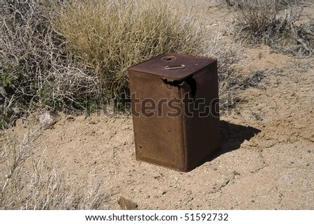 stock photo Old rusty can on the desert floor in Death Valley National 