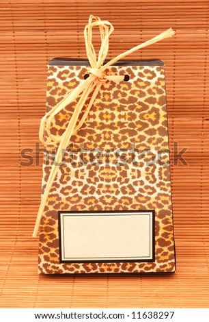 An African luxury hotel spa welcome bag on bamboo background