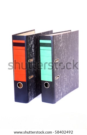 Two old used office folders. Image isolated on white studio background.