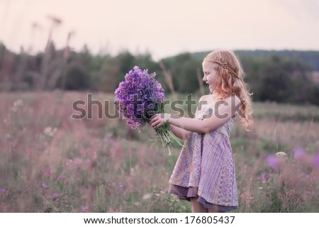 beautiful girl with flowers outdoor