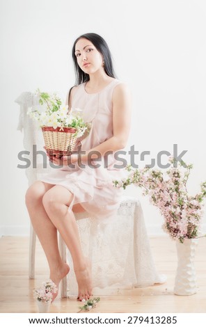 beautiful women with spring flowers indoor