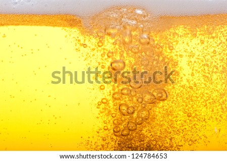 Beer Bubbles In The High Magnification And Close-Up.