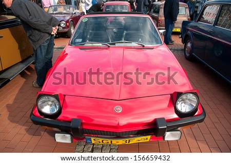 BYTOM, POLAND - SEPTEMBER 21: X Old Classic Car Parade. Cars are parked and admired by automotive enthusiasts. The parade was attended by about 100 cars on September 21, 2013 in Bytom, Poland.