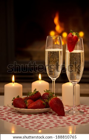 Champagne, strawberries, candles and a romantic evening by the fireplace.