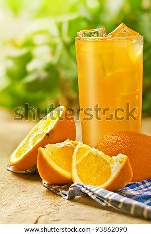 Orange juice on the wood surface, outdoor