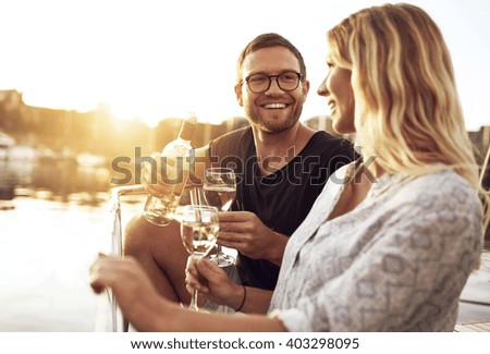 Man and Woman Drinking Wine Outside a Summer Day