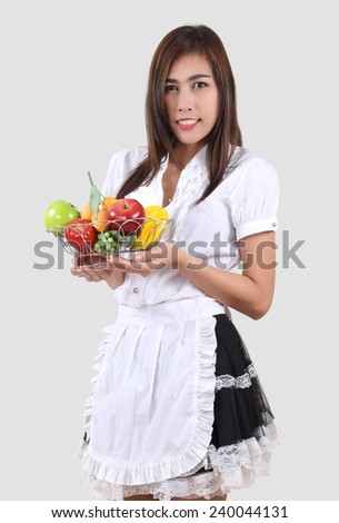 young waitress in a white blouse and black skirt with a tray in her hand
