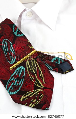 A necktie pin and white shirt for business man