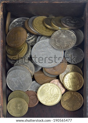 money in a wooden case