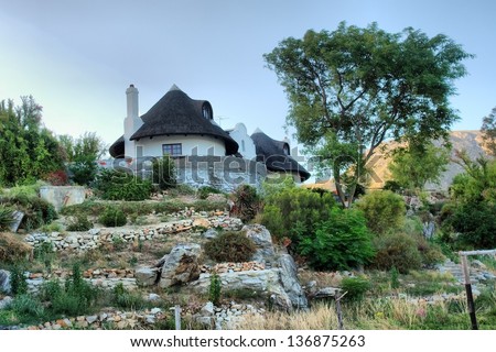 Fairy-tail-looking house on hill in dusk. Shot in Montagu, Western Cape, South Africa.