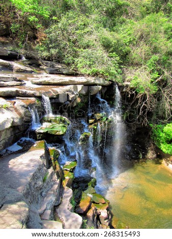 Waterfall on small river. Shot in Paradise Valley Nature Reserve, Durban, South Africa.