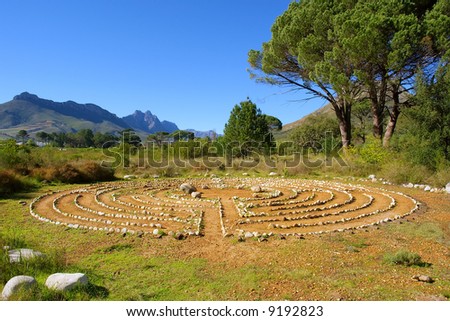 Circular sign made of rocks. Shot in August in Jan Marais Nature Reserve, Stellenbosch, South Africa.