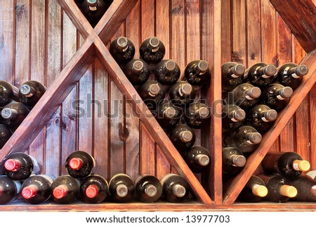 Array of bottles in wine storage in a restaurant. Shot in West Coast Nature Reserve, near Langebaan, Western Cape, South Africa.