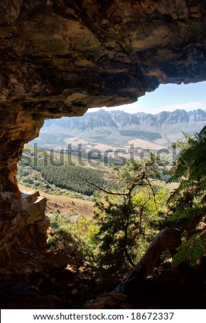 View from cave at farmlands. Shot in the Bat Cave, Helderberg Mountains Nature Reserve, near Somerset West/Cape Town, Western Cape, South Africa.
