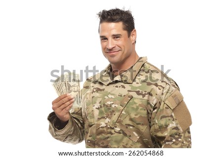 VETERAN SOLDIER | MONEY FOR COLLEGE | PAYDAY LOAN | MILITARY FUNDING|  Smiling army sergeant holding money against white background.  Payday loan | Cash for School | Military Lenders and Lending