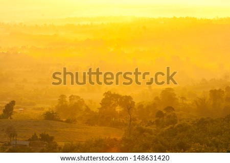 Autumn fog and the beautiful morning sun in a landscape