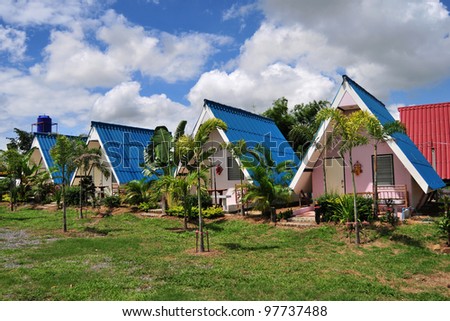  - stock-photo-blue-roof-house-in-the-country-thailand-97737488