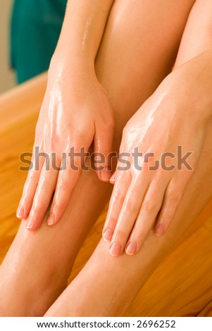 ayurvedic legs therapy massage procedure with oil