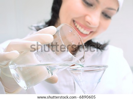biological test of the water. Soft-focused, focal point is on the hands