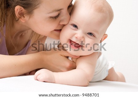 Mother\'s love. Cute baby 5 month with mother. [5 months]