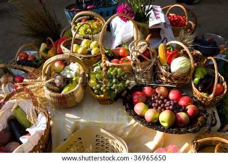 Autumn market - fresh fruits and vegetables in the baskets