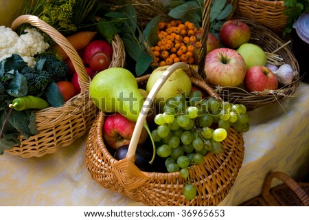 Autumn market - fresh fruits and vegetables in the baskets