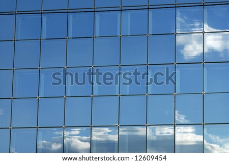 Modern skyscraper window reflections, close-up image, more photos in gallery
