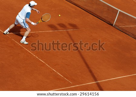 Close up image of player on a tennis court