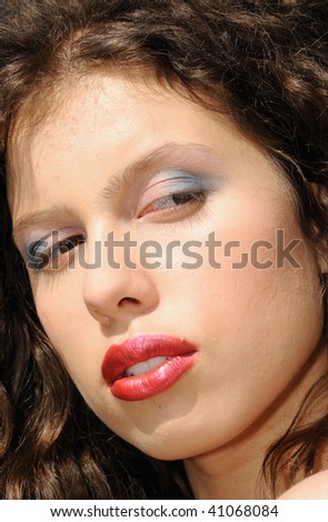 Female beauty posing, close up image of face, makeup concept