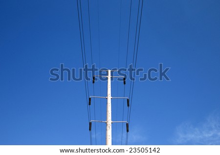 High Power electric lines and blue ski.