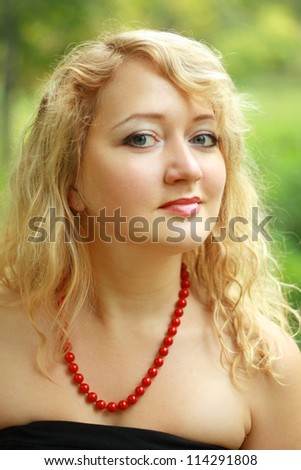 Portrait of young beautiful woman plus size blond woman
