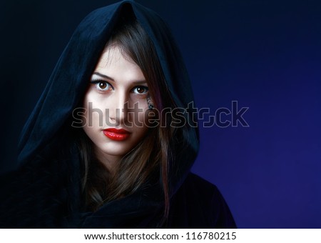 beautiful mysterious woman in black hood evil halloween witch look