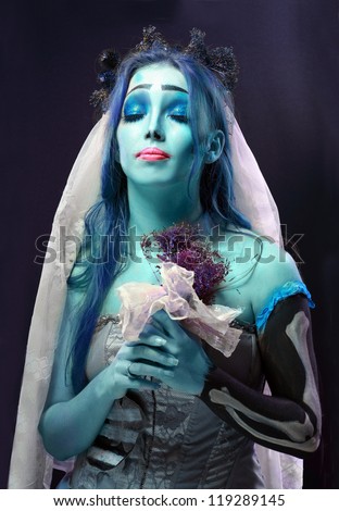 Halloween: Sorrow scene of a corpse bride under blue moon light