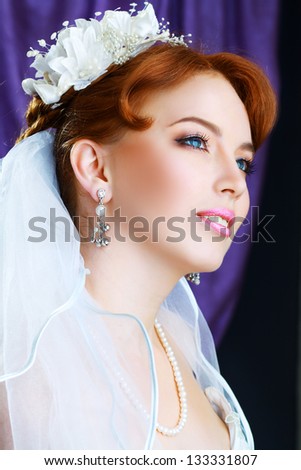 beautiful bride portraite with perfect bridal make up and hairstyle