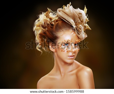 Luxury Golden Makeup. Beautiful Professional Holiday Make-up. Gold Teen Fashion Girl. Fashion Art Portrait.