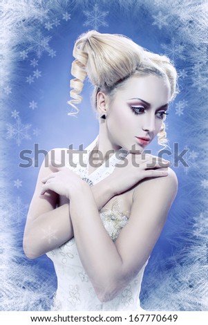 ice-queen. Young winter woman in creative image with silver pink artistic make-up and perfect hairstyle.