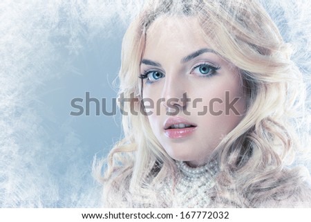 ice-queen. Young winter woman in creative image with silver blue artistic make-up and perfect hairstyle.